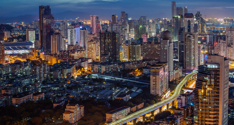 A glittery night skyline reflects the prosperity of Xiamen’s economy