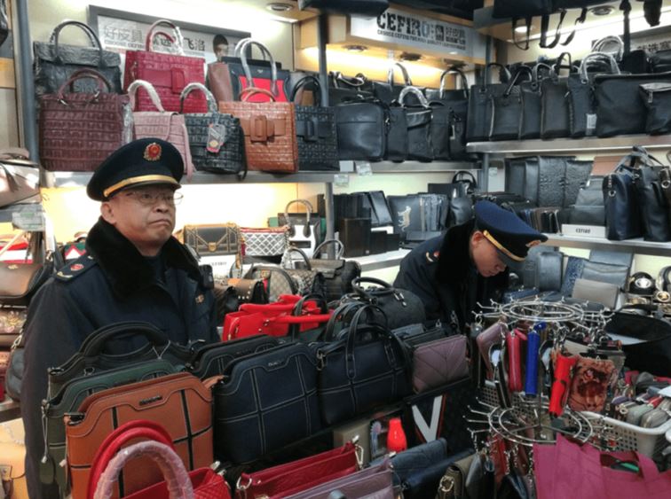 Officers in Gansu destroy seized counterfeit goods