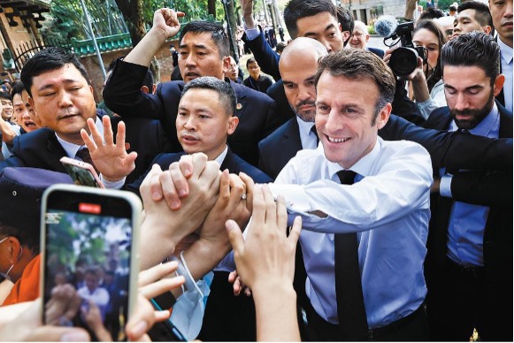 French President Emmanuel Macron was welcomed by enthusiastic students at Sun Yat-sen University in Guangzhou